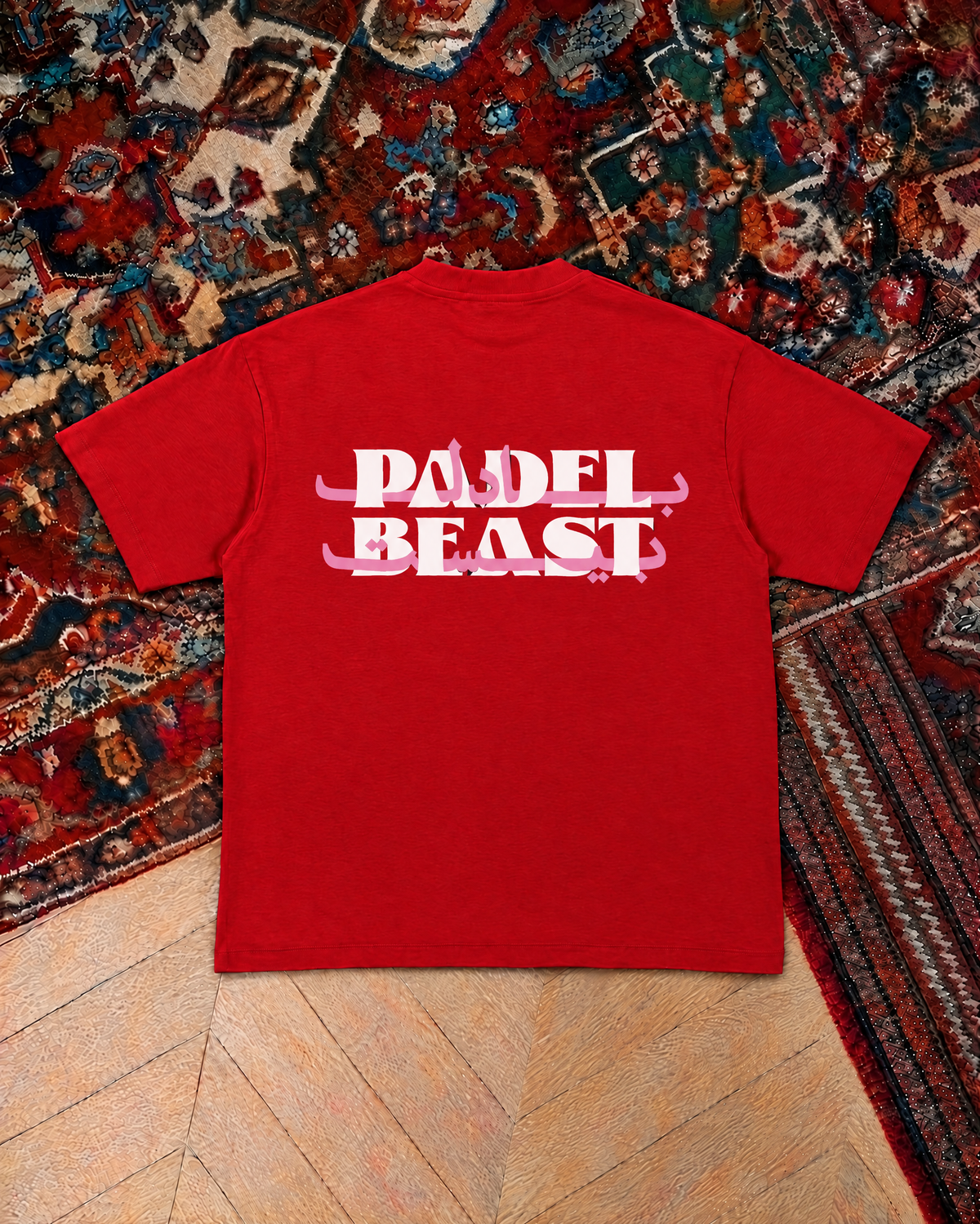 Padel Beast Arabic wordmark, red t-shirt with white and pink print, back