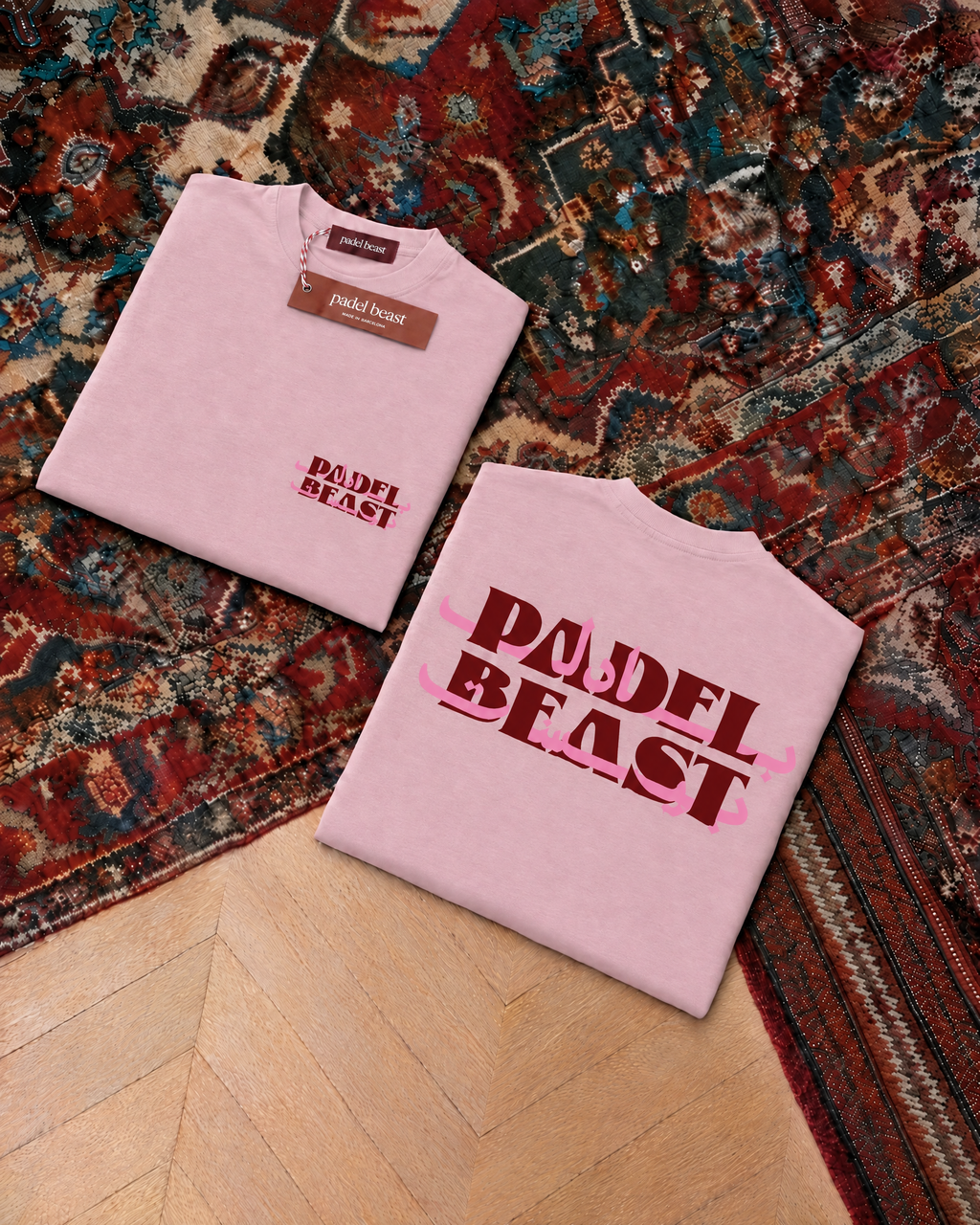 Padel Beast Arabic wordmark, pink t-shirt with red and pink print, front and back