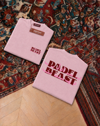 Padel Beast Arabic wordmark, pink t-shirt with red and pink print, front and back