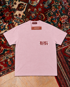 Padel Beast Arabic wordmark, pink t-shirt with red and white print, front