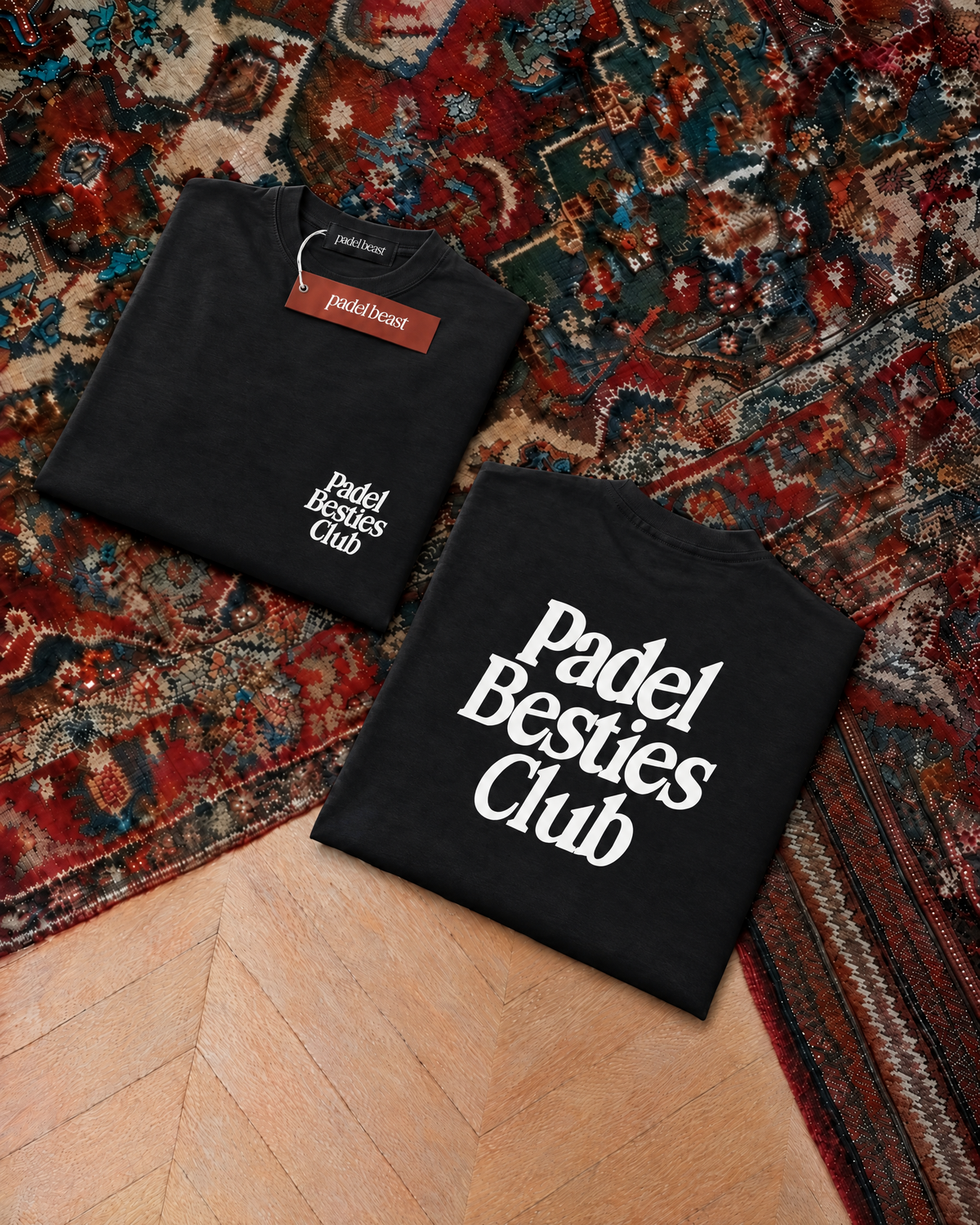 Padel Besties Club tee in black, folded front and back