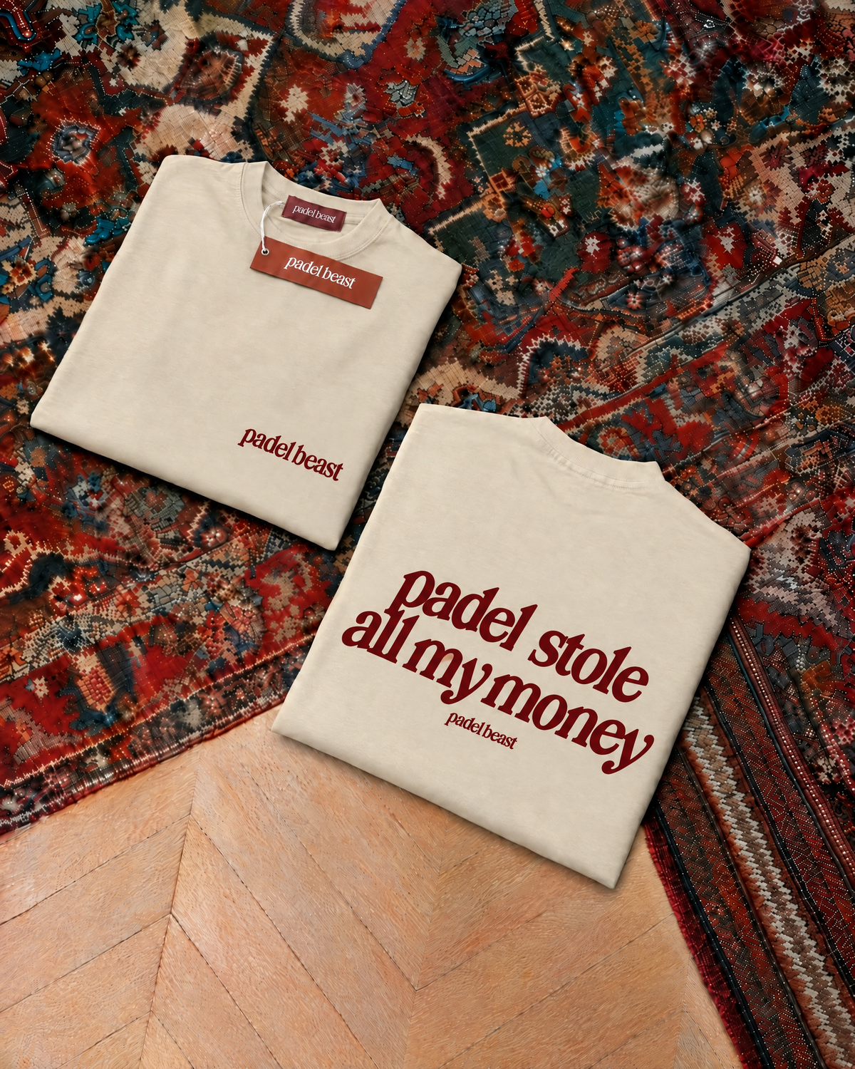 Padel Stole All My Money tee in cream with oxblood print, folded front and back