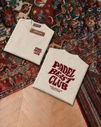 Padel Beast Club tee in cream with oxblood print, folded front and back