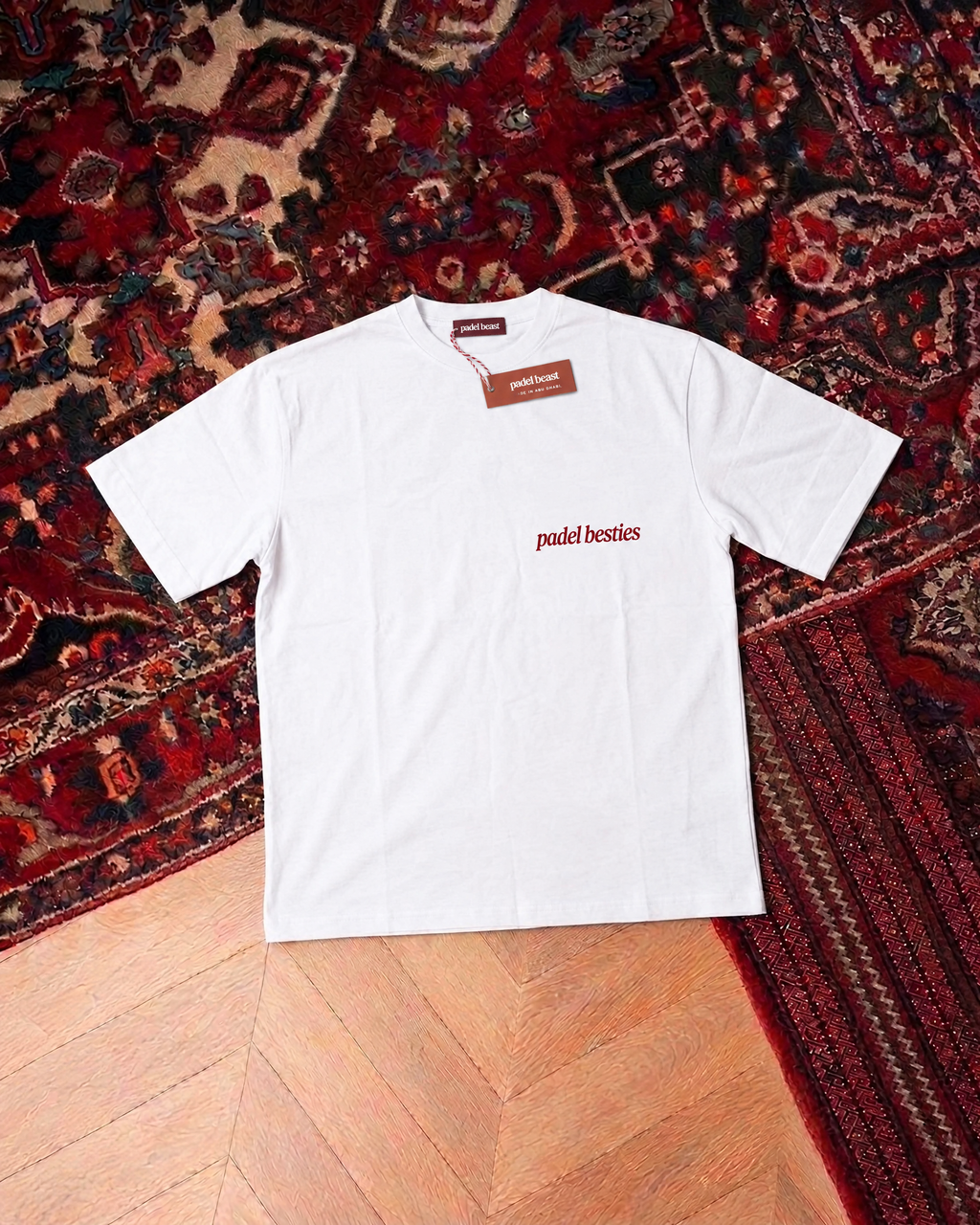 Padel Pretty Girls white tee front, red print, new neck label and hangtag