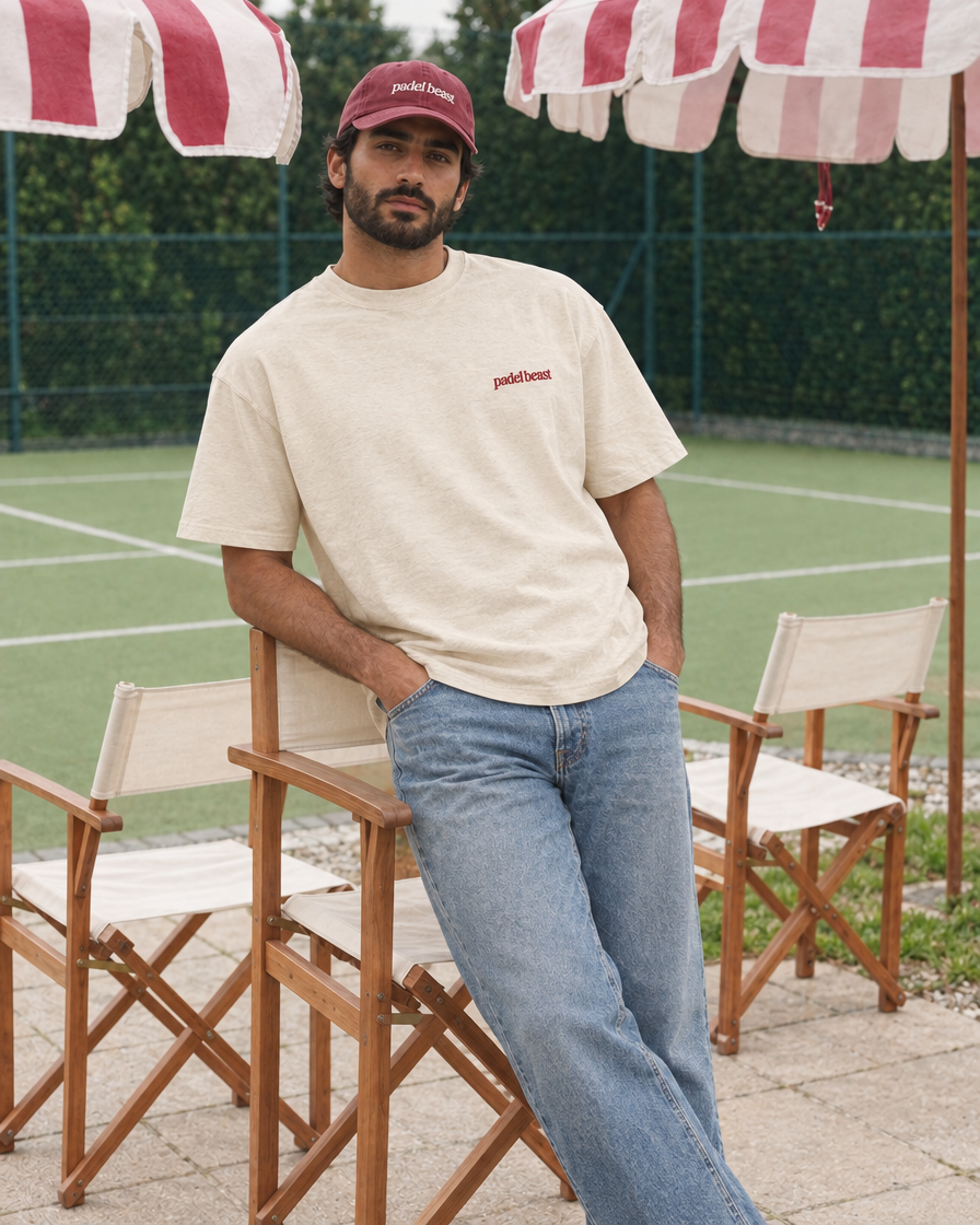 Padel stole all my money cream tee on a man, front