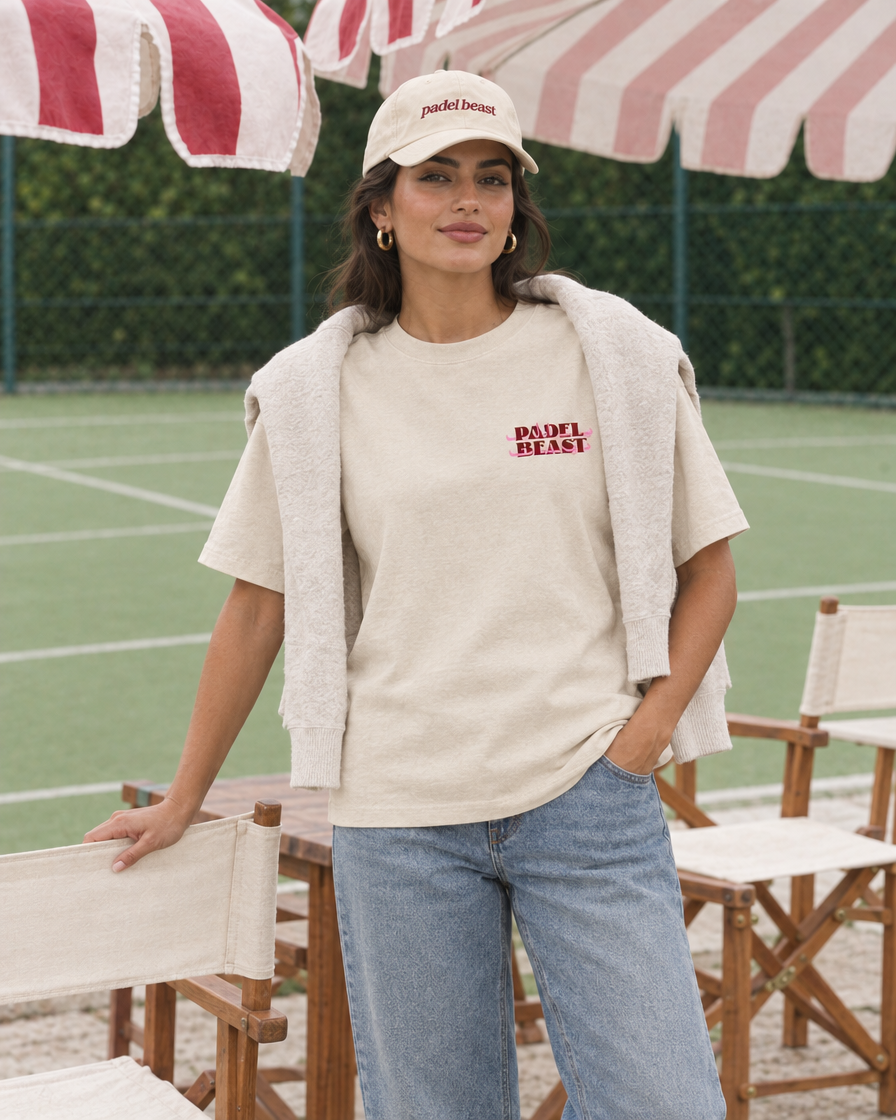 Padel Beast Arabic cream tee on a woman, front