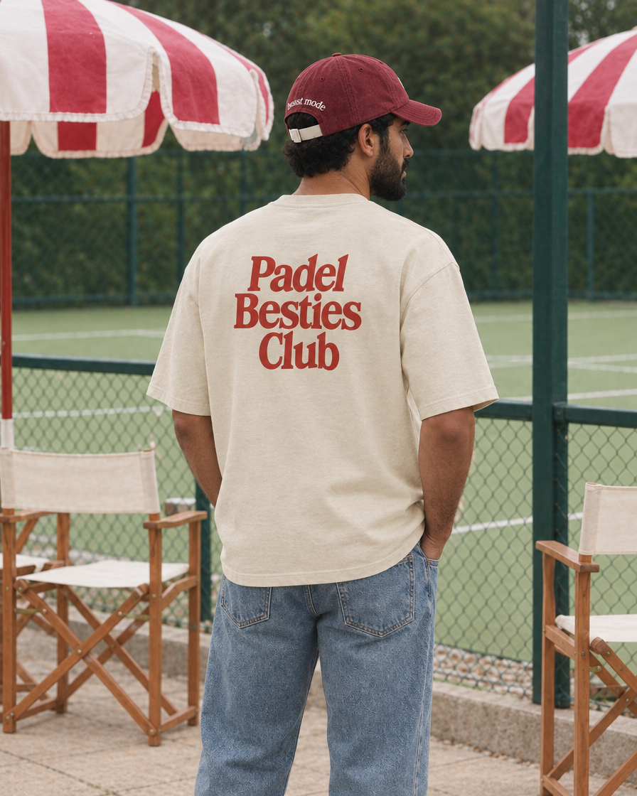 Padel Besties Club cream tee on a man, back print