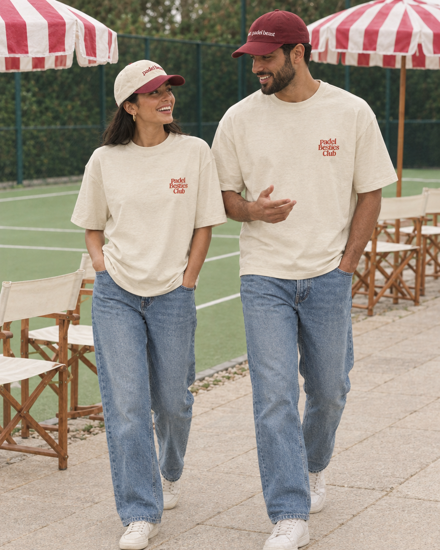 Couple wearing the Padel Besties Club cream tee