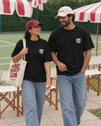 Couple wearing the Padel Beast Club black tee