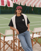 Padel Beast Club black tee on a woman, front