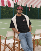 Padel Beast Arabic black tee on a man, front
