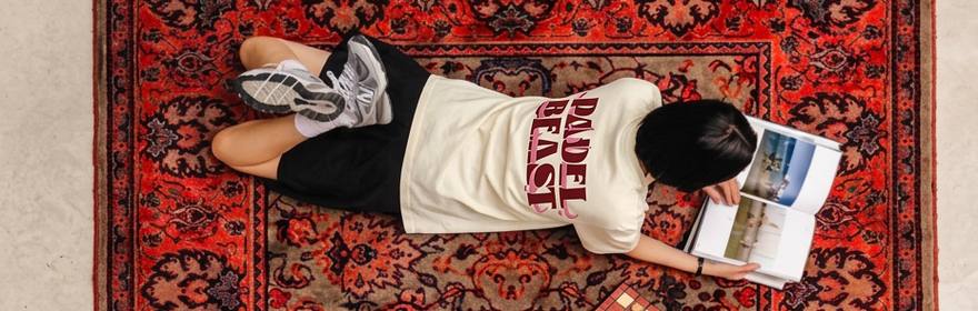 Padel Beast tee on a Persian rug